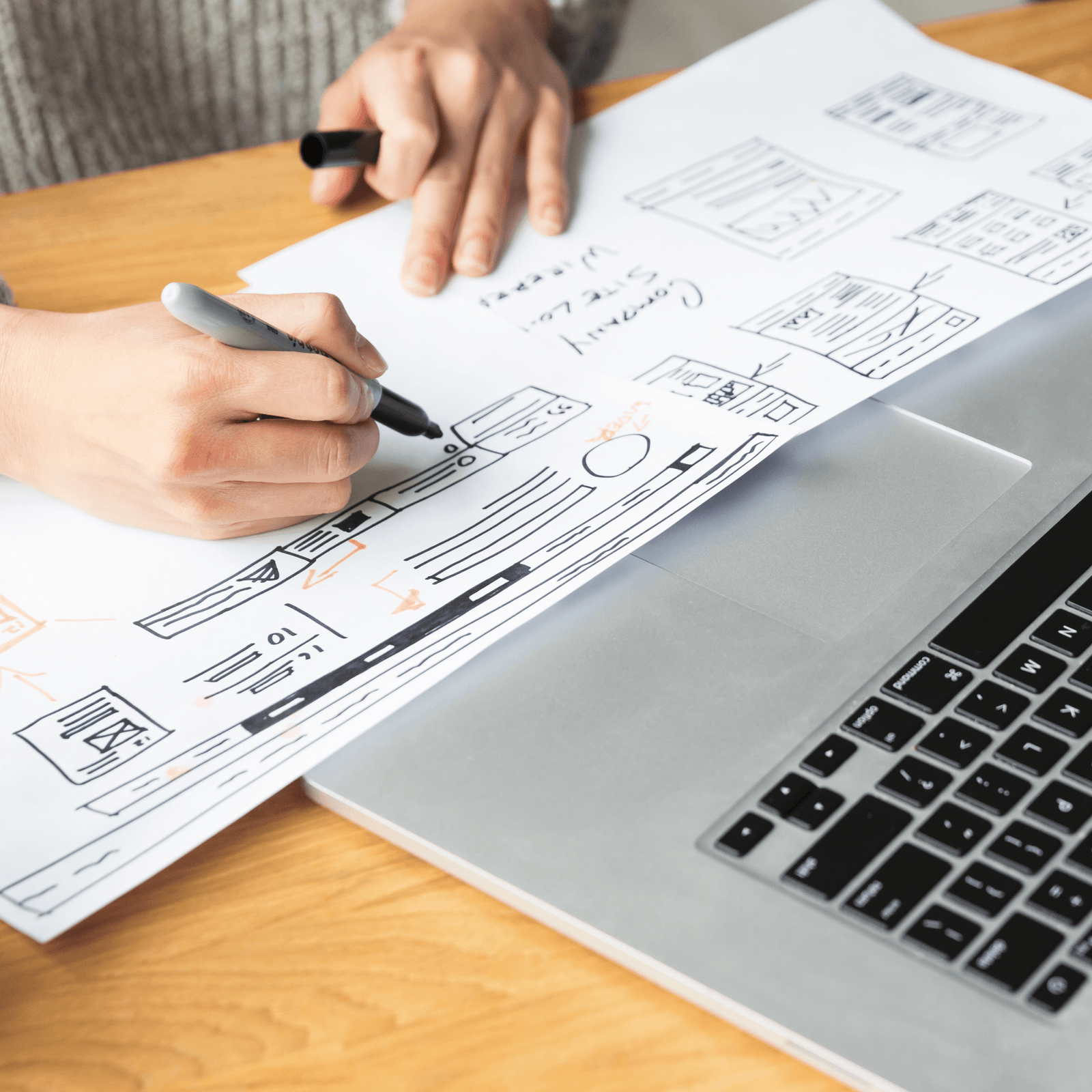 Person drawing website design