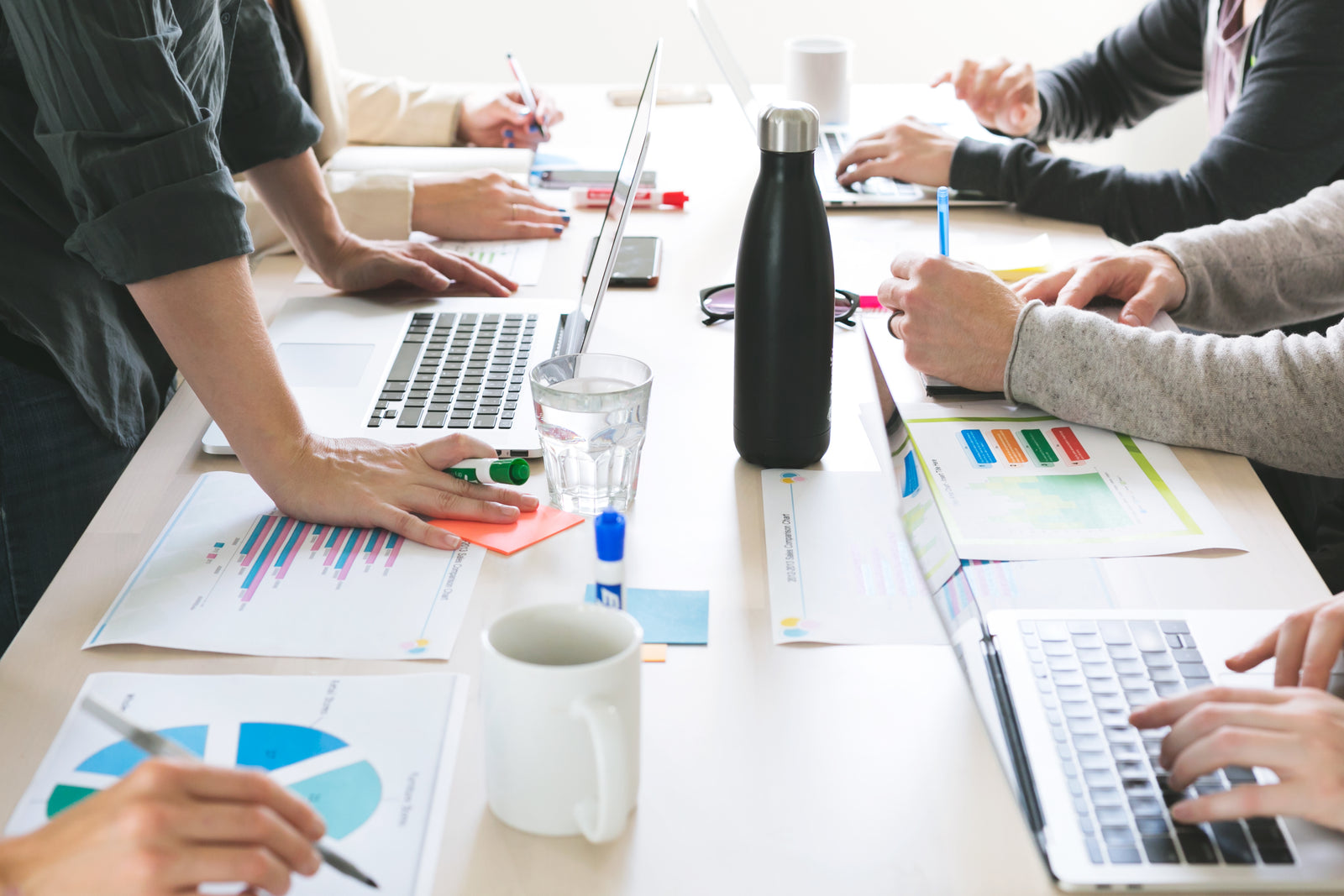 Six people collaborating at a table
