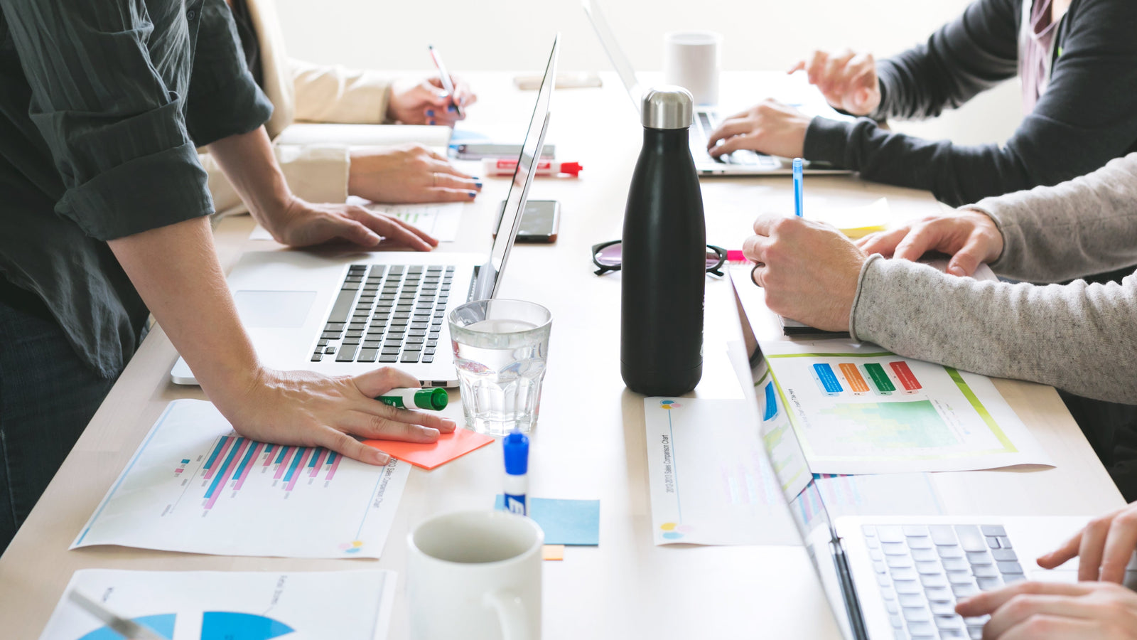 Six people collaborating at a table