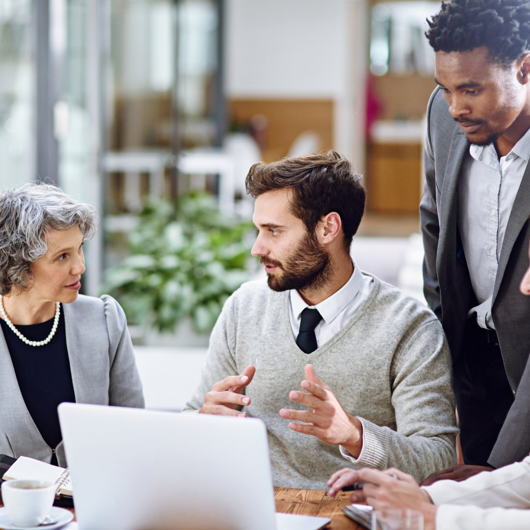 A consulting person helping a business team