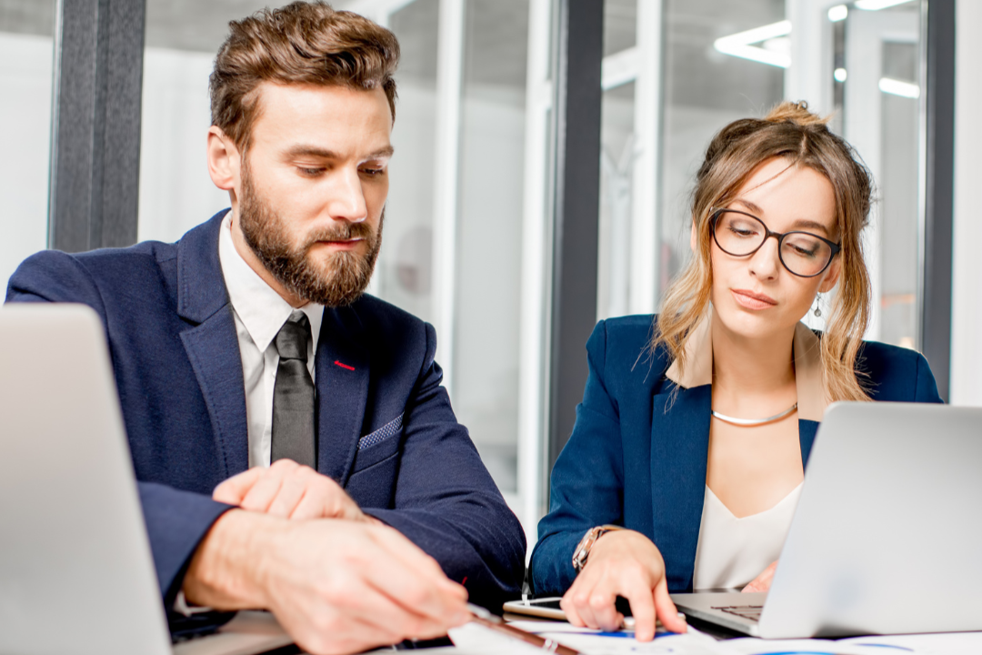 Two office workers collaborating