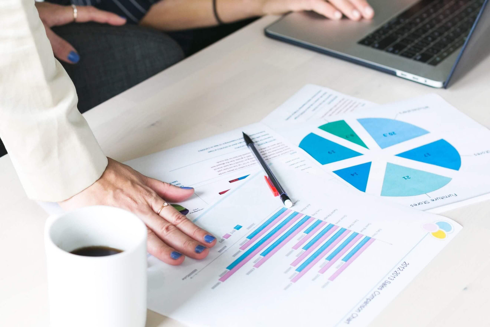 People collaborating over a laptop